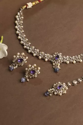 Flower and oval shape blue kundan stone gold plated choker necklace set with maang tikka for women
