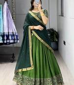 Green printed ethnic lehenga set with blouse and dupatta