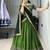 Green printed ethnic lehenga set with blouse and dupatta