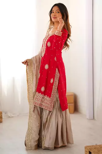 Beige sharara set with intricate embroidery work