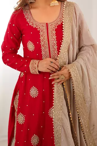 Beige sharara set with intricate embroidery work