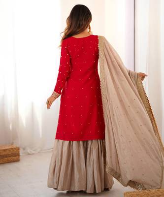Beige sharara set with intricate embroidery work 5