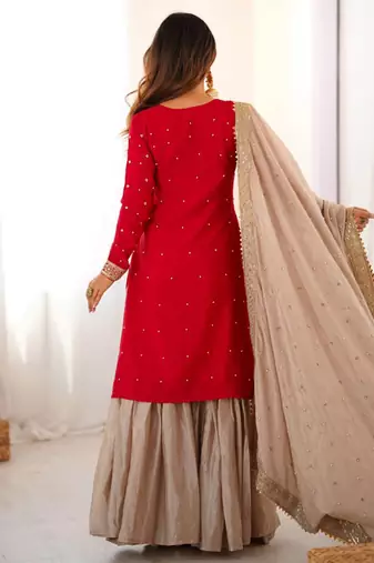 Beige sharara set with intricate embroidery work