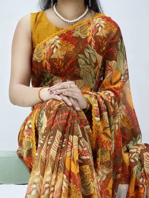 mustard floral printed georgette saree with lace border	 2