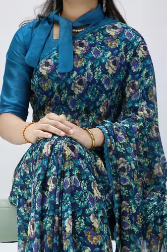 navy blue floral printed georgette saree with lace border	