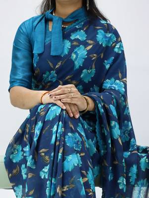 sky blue floral printed georgette saree with lace border	 2