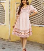 Pink embroidered cotton dress