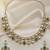 Bridal style kundan green stone necklace set with earrings