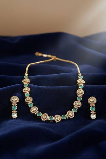 Gold-plated moissanite & mint stone necklace set with matching earrings
