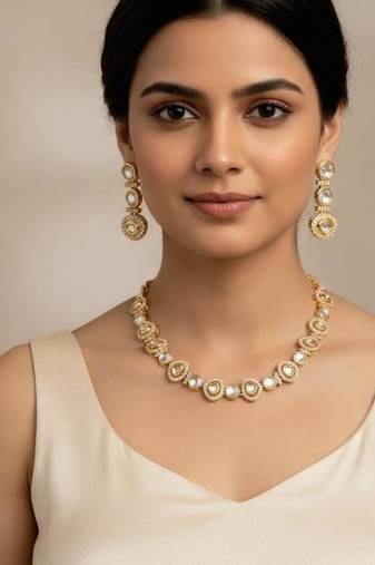 Gold-plated moissanite & white stone necklace set with matching earrings