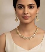 Gold-plated moissanite & white stone necklace set with matching earrings