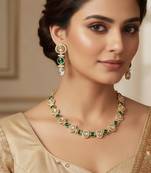 Gold-plated moissanite & green stone necklace set with matching earrings