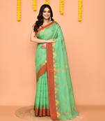 green cotton blend handloom saree with red border