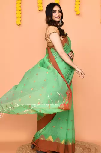 green cotton blend handloom saree with red border