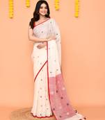 off white linen jamdani saree with red blouse & tassels