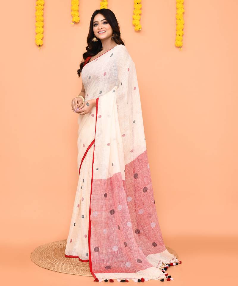 off white linen jamdani saree with red blouse & tassels