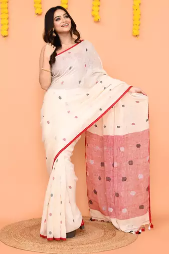 off white linen jamdani saree with red blouse & tassels