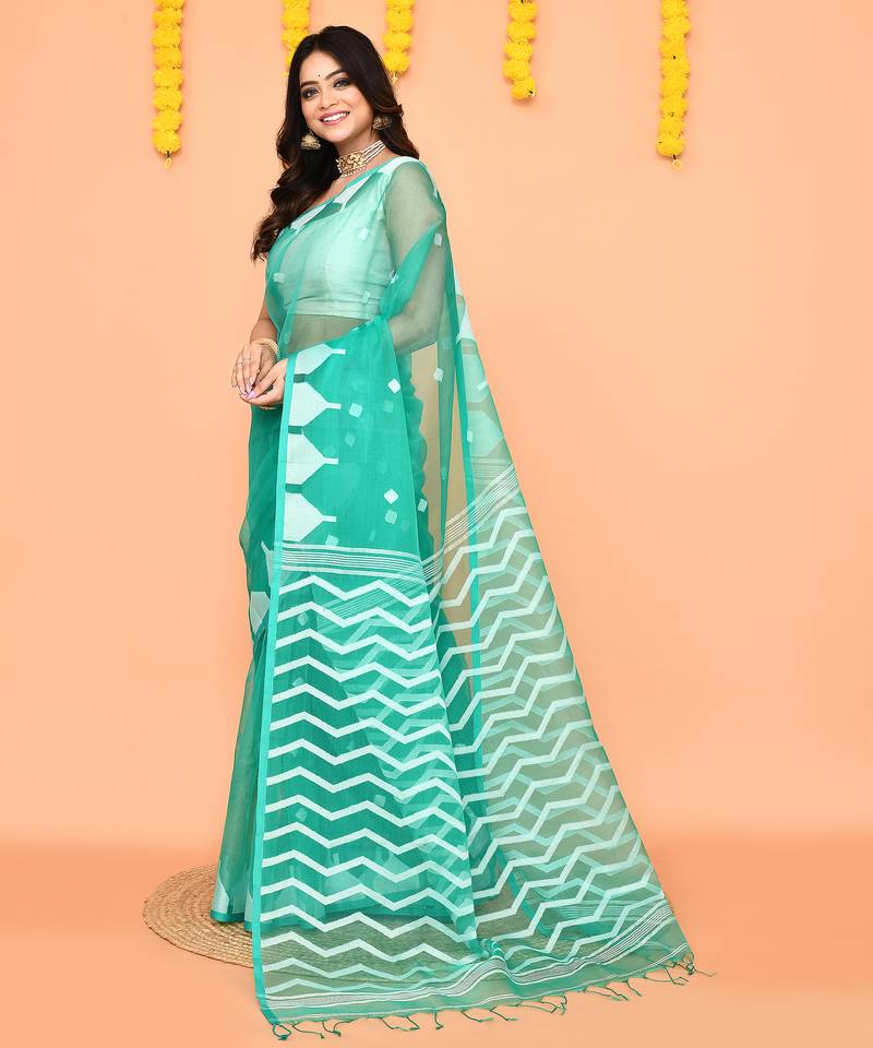 turquoise silk jamdani saree with handwoven pallu