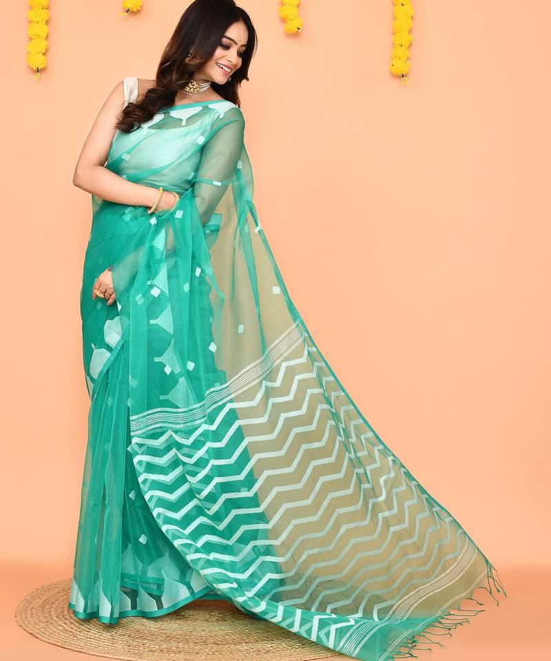 turquoise silk jamdani saree with handwoven pallu