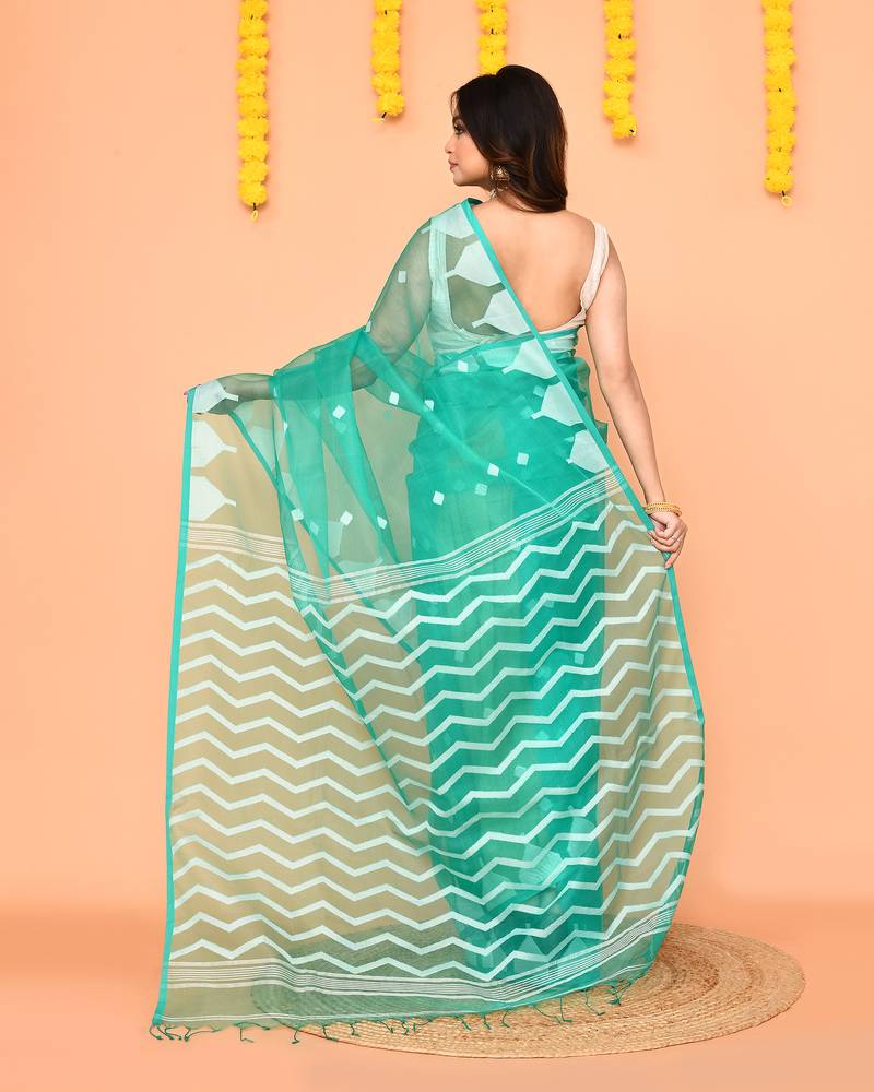 turquoise silk jamdani saree with handwoven pallu