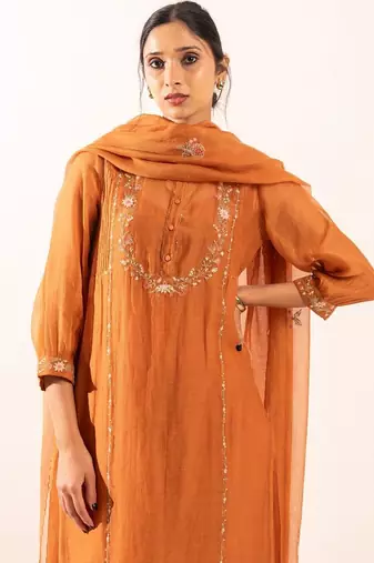 Rust orange camellia suit set with duppata