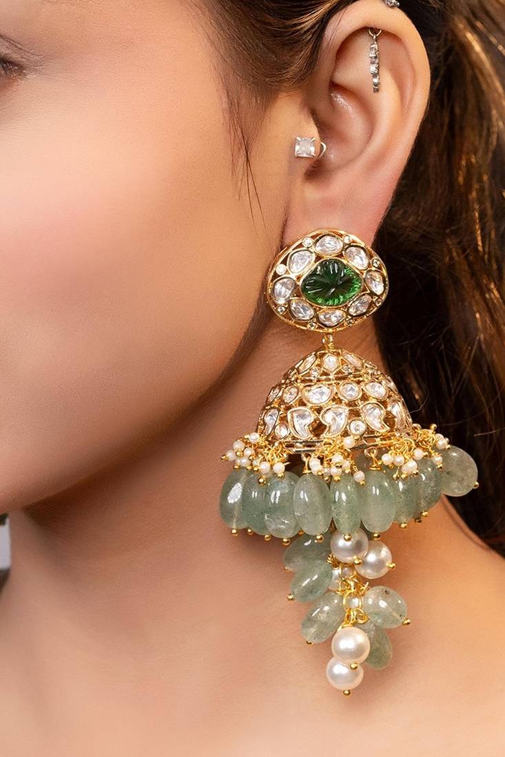 Gold plated kundan green stones jhumka earrings