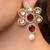Gold plated kundan red stones drop earrings
