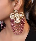Gold plated kundan red stones drop earrings