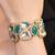 Gold plated kundan green stones bracelet