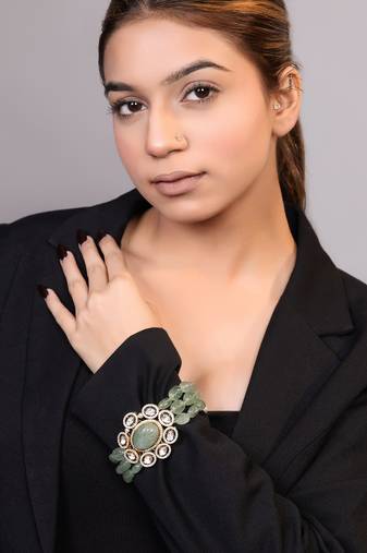 Gold plated kundan green stones bracelet