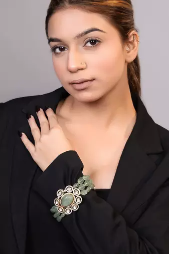 Gold plated kundan green stones bracelet