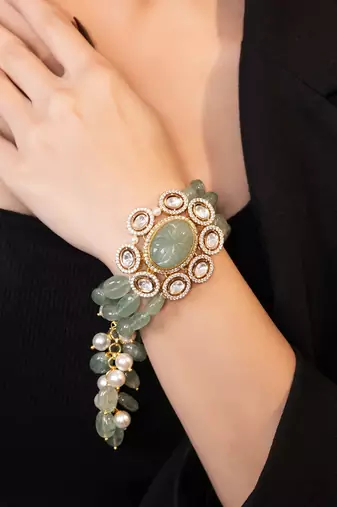 Gold plated kundan green stones bracelet