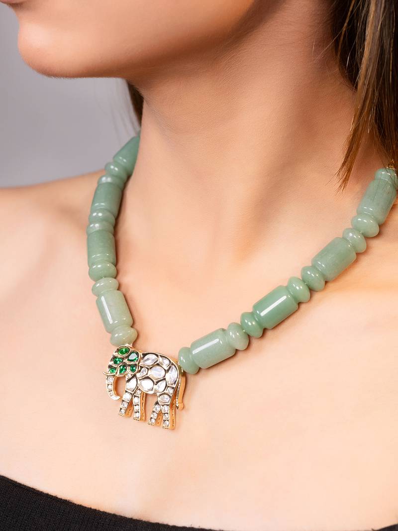 Gold plated kundan green stones necklace
