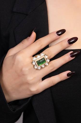 Gold plated kundan green stones ring