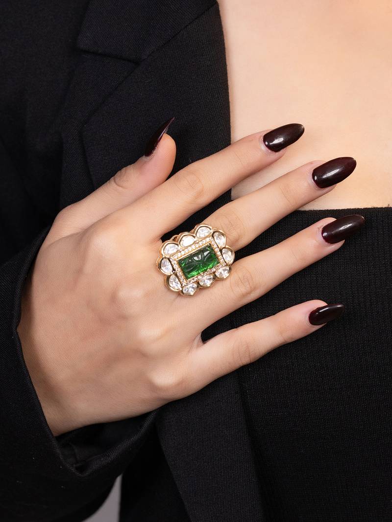 Gold plated kundan green stones ring