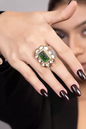 Gold plated kundan green stones ring