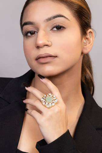 Gold plated kundan green stones ring