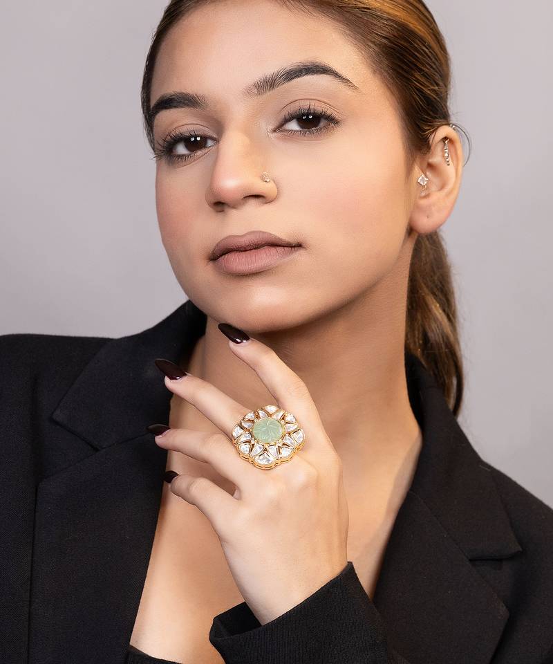 Gold plated kundan green stones ring