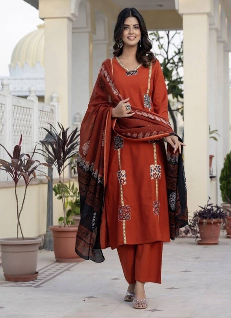 orange floral printed cotton kurta trouser and dupatta set