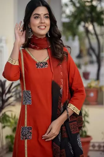 orange floral printed cotton kurta trouser and dupatta set