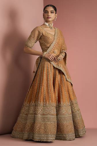 rust orange raw silk lehenga set with blouse and dupatta