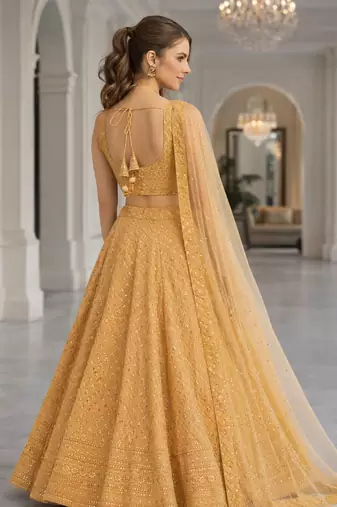 BEIGE GEORGETTE SEQUINS & THREAD EMBROIDERED LEHENGA SET WITH CHOLI AND DUPATTA