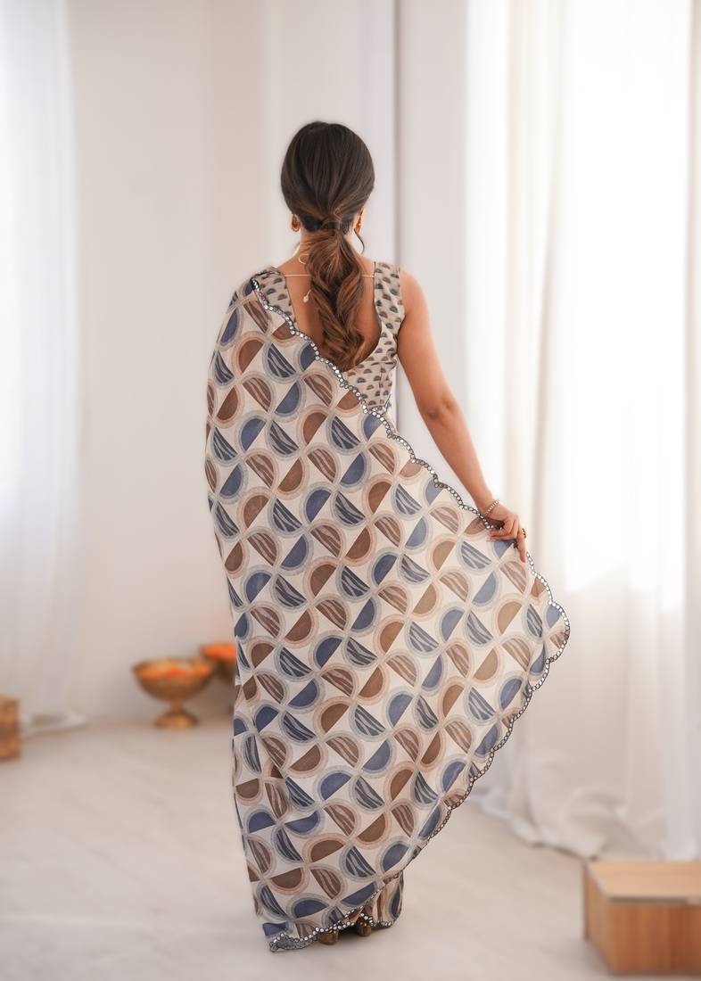 chiku heavy chinon printed saree with mirror work border