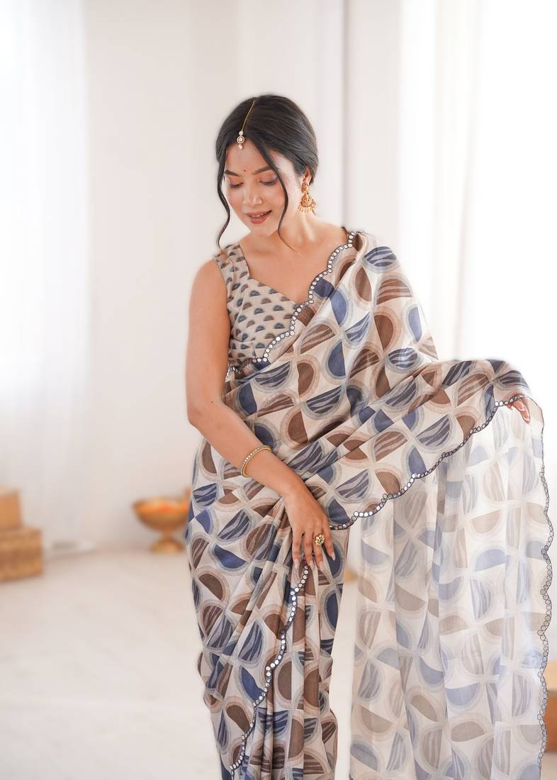 chiku heavy chinon printed saree with mirror work border