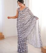 grey  heavy chinon printed saree with mirror work border
