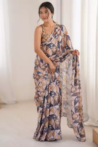cream  heavy chinon printed saree with mirror work border