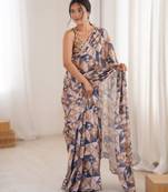 cream  heavy chinon printed saree with mirror work border