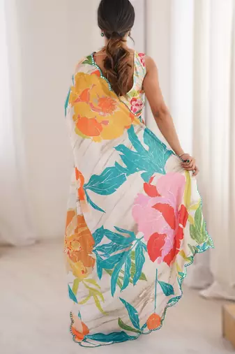 White chinon printed saree with mirror work border