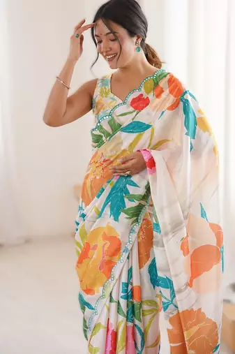 White chinon printed saree with mirror work border