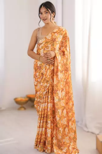 Yellow heavy chinon printed saree with mirror work border